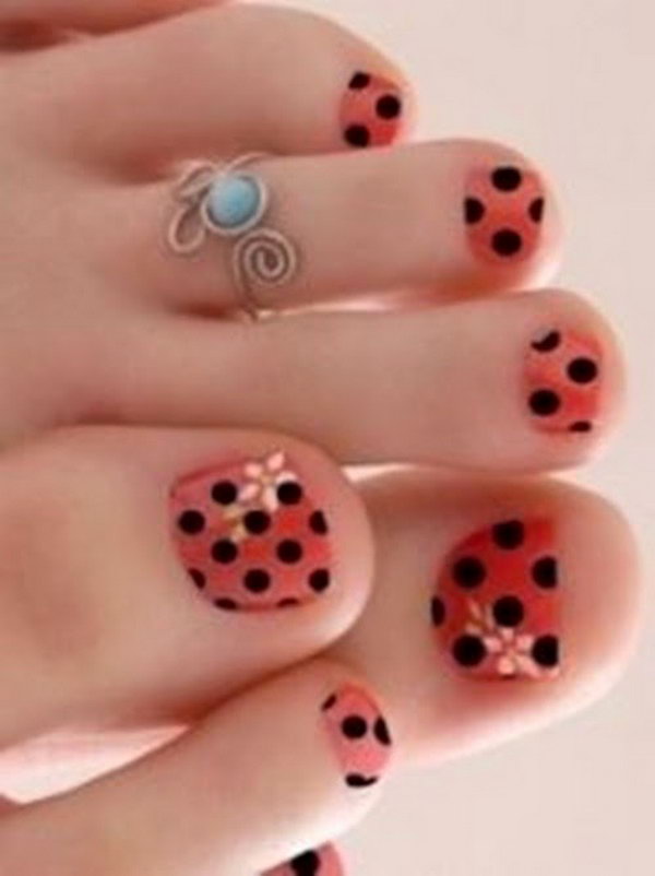 Orange and Black Polka Dots Toe Nails. 