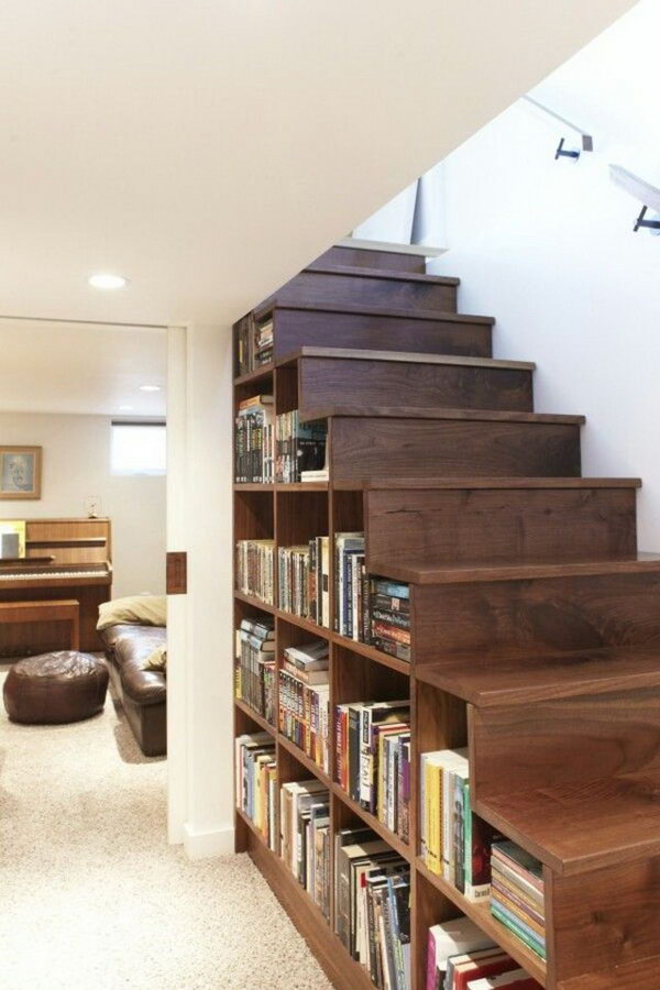 Display your book collection under the stairs. 