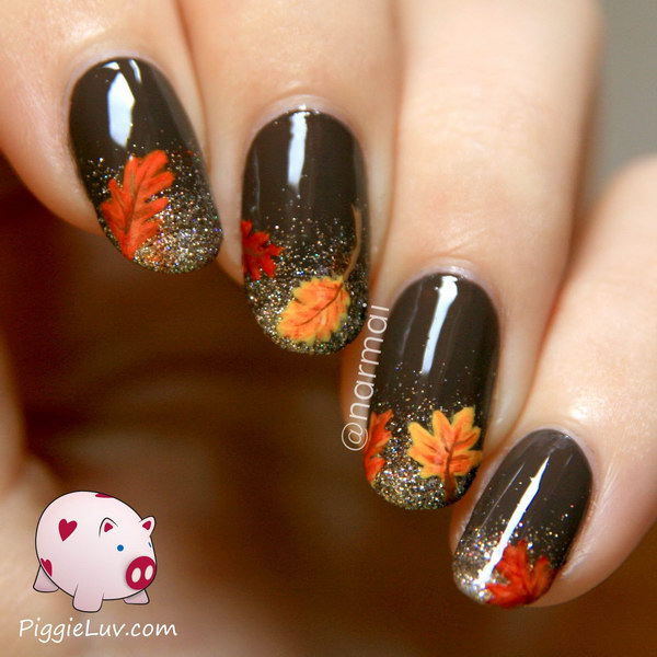 Glitter French Tip Nail Finished with Fall Flowers on Top. Get the step by step tutorial 
