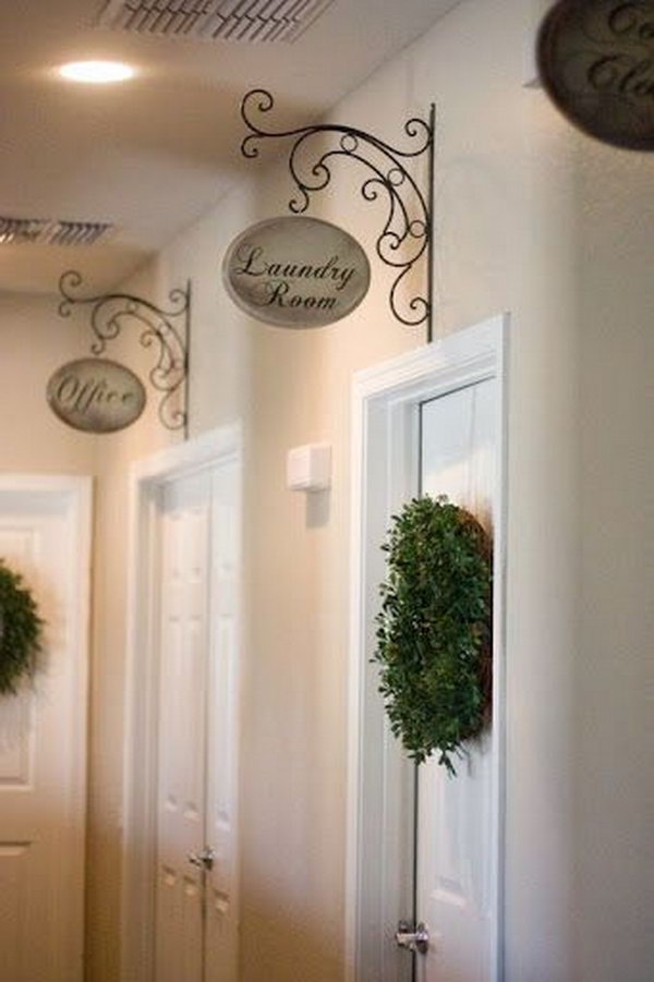 Make Hallway Signs out of Brackets from Hardware Store and Wood from Hobby Lobby. 