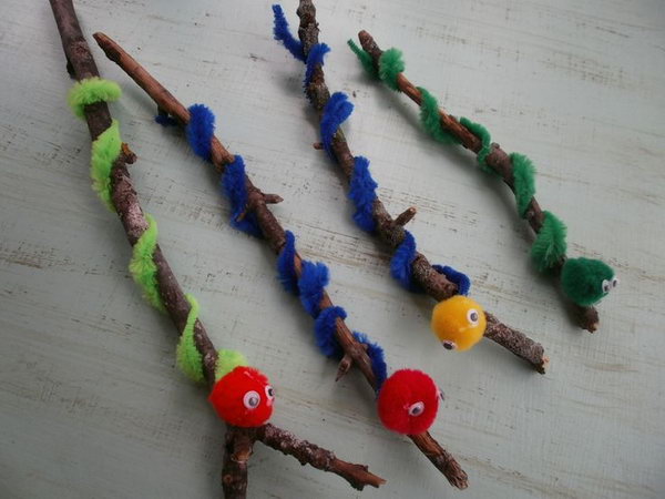 Make a Worm Using a Twig, Pipe Cleaners and Pom Poms. 