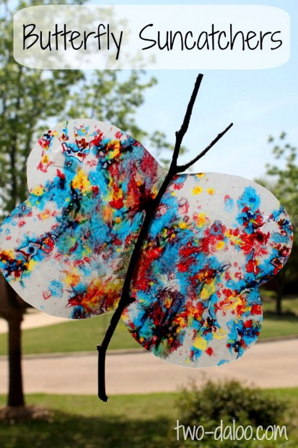 Make a Butterfly Suncatcher Using a Twig, Wax Paper and Melted Crayon. 