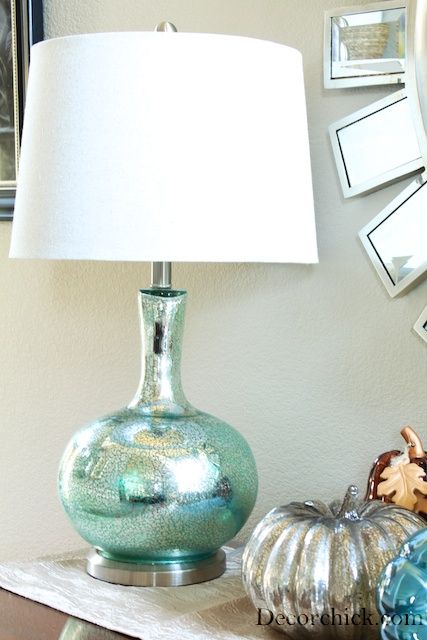 IY Mercury Glass Lamp. A little mercury glass spray paint makes a thrift store lamp get a gorgeous and expensive look. 