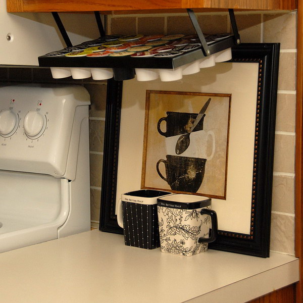 Coffee Keepers Under Cabinet. The rack efficiently uses what is normally wasted space under the cabinet and frees up valuable counter space. No more loose cups on the counter! 