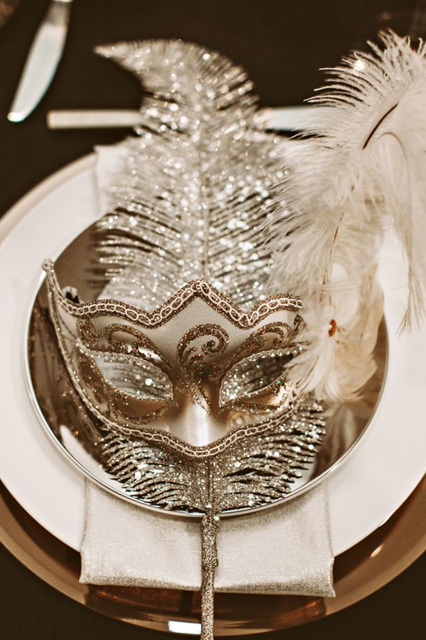 A Mask at Each Table for a New Year Party Decoration 
