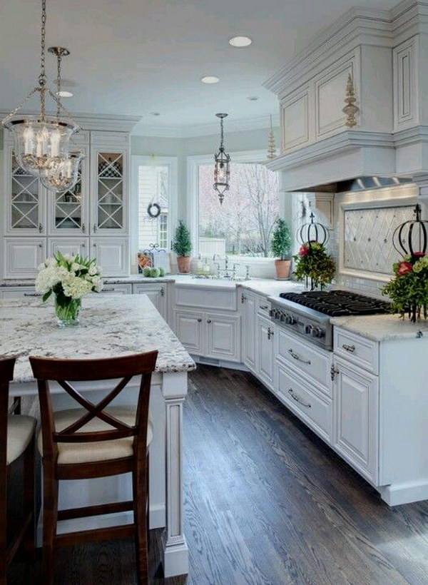 White Transitional Kitchen With Snow White Granite Countertops. 