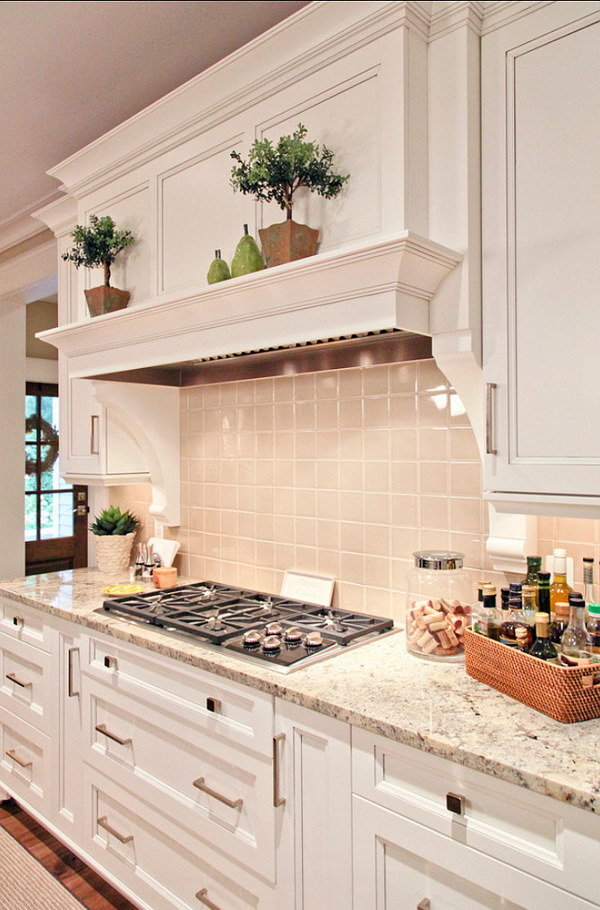 White Kitchen with Persia Avorio Granite Countertop. 