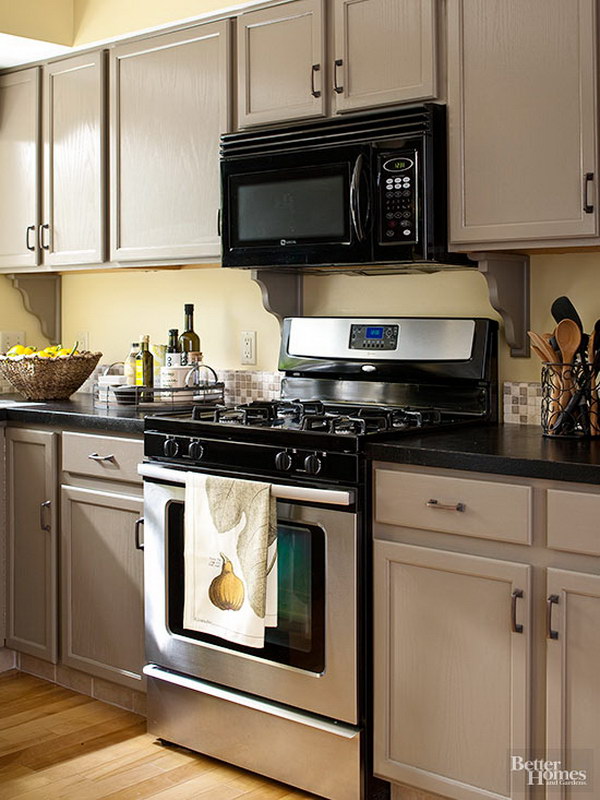 An Inviting Blend of Brown and Gray Kitchen Cabinet Paint Color. 