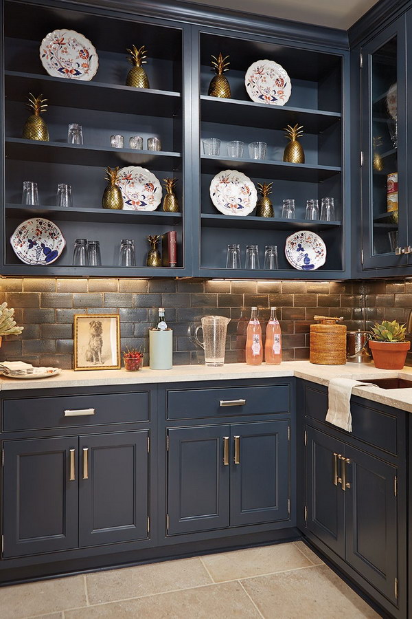 Dramatic Navy Blue Open Cabinetry with a Graphite Black Splash. 