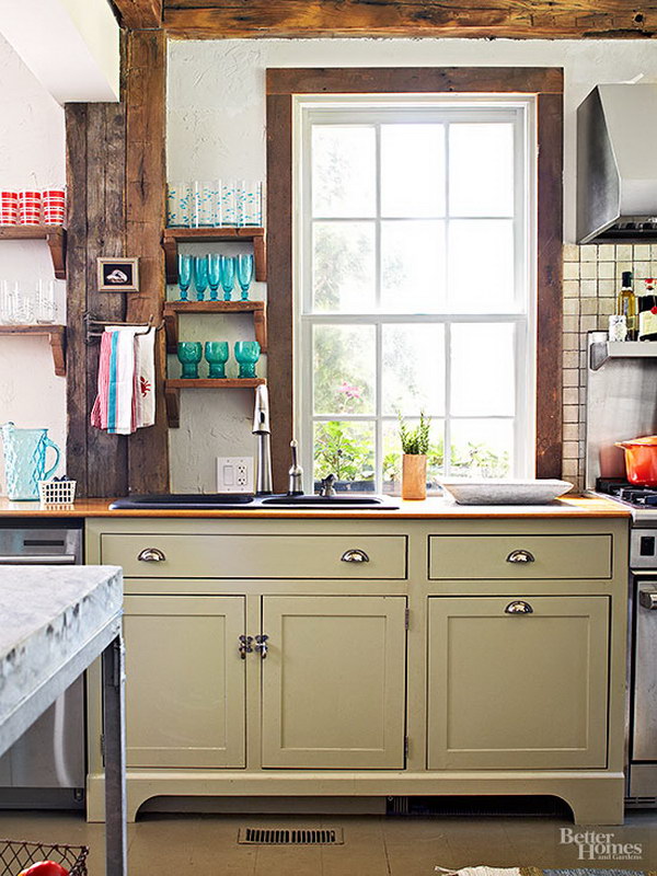 Sage Green Painted Cabinets with Rustic Elements for a Kitchen. 