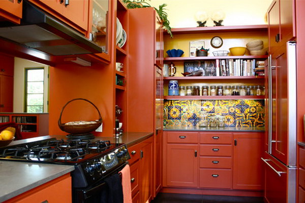 Rich Red Orange Open Cabinets With Multicolored Backsplash And Paneled Appliances. 