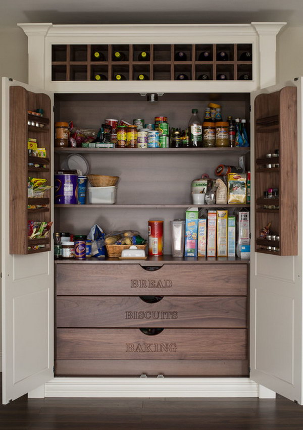 Built in Pantry with Labeled Wood Drawers and the Wine Rack at The Top. 