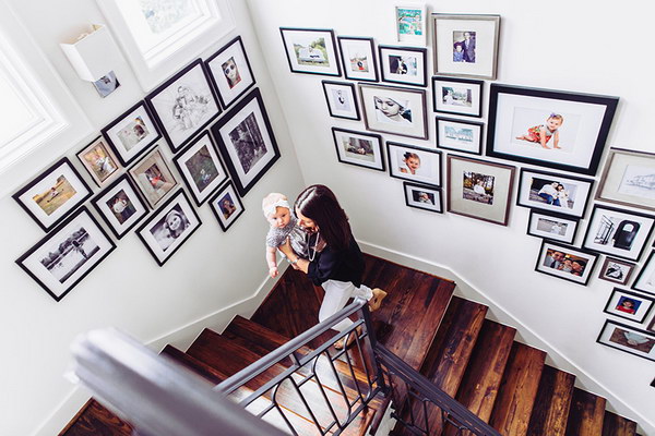 It's a perfect way to express parents' love by displaying pictures of your child's milestones on your stairwell wall. 