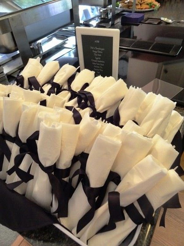 Cutlery Wrapped In Napkins To Look Like Diplomas. 