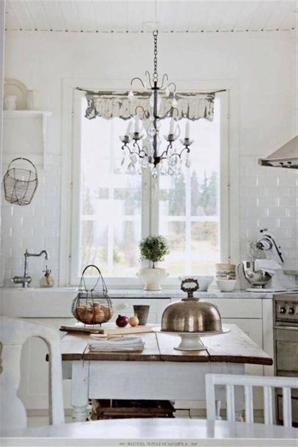 Shabby Chic White Kitchen With Chandelier Lighting Fixture. 