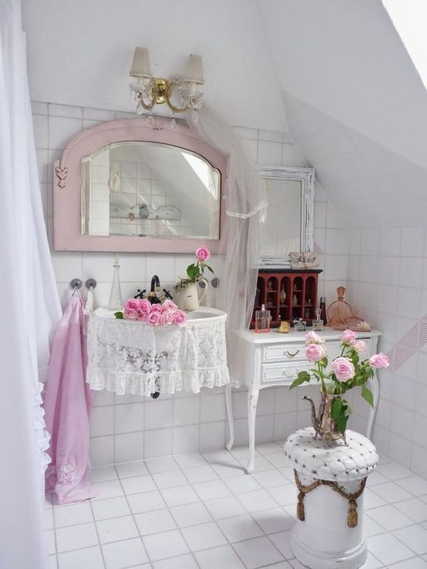 Charming Bathroom Decorated With White Tiles And Pink Accessories 