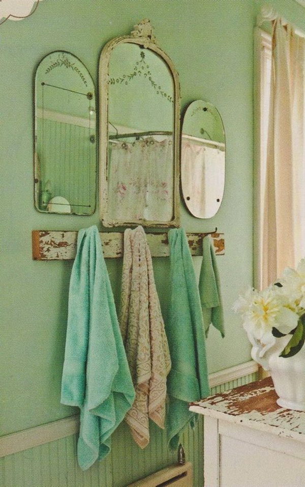 Beautiful Grouping Of Vintage Mirrors And Salvaged Board On Sage Green Walls And Beadboard 