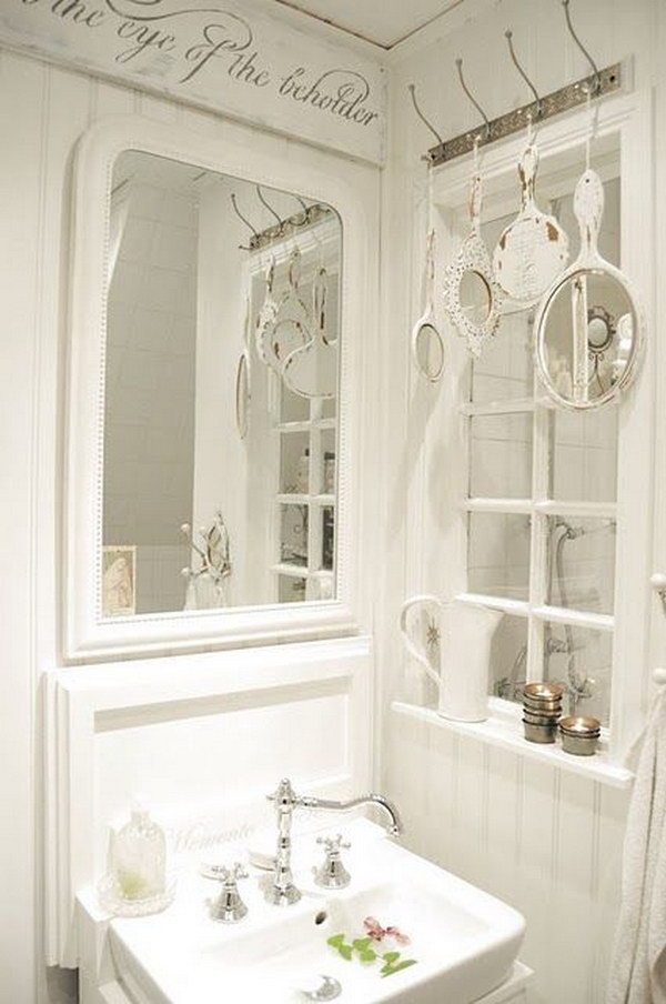 Old Hand Mirrors Displaying Above Bathroom Window 