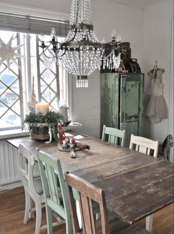 Rustic Chic Dining Room with Reclaimed Wood Table and a Vintage Crystal Chandelier 