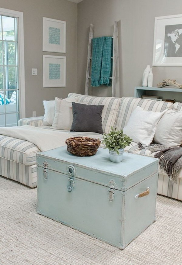 Shabby Chic Living Room with Pastel Blue Coffee Table Trunks and Striped Sectional 