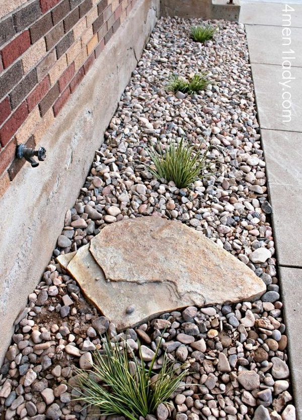 Use A Large Rock To Prevent Erosion From The Outdoor Spigot. 